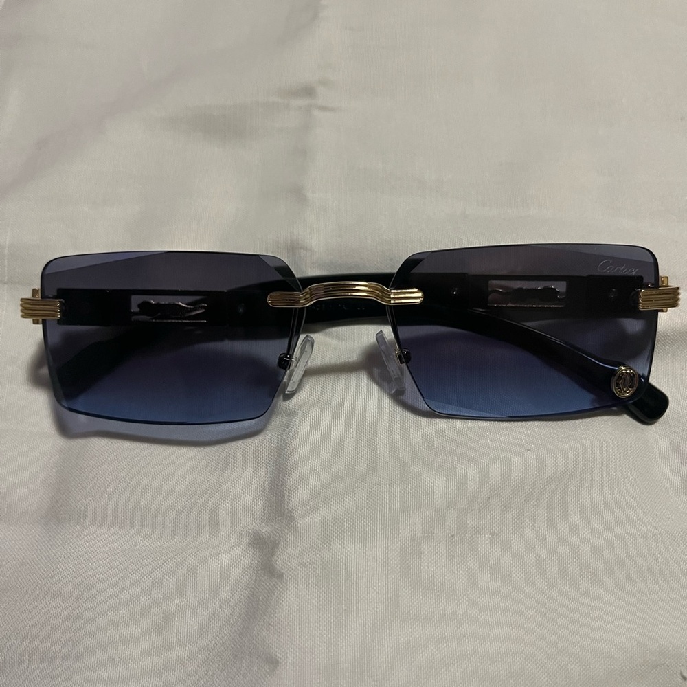 Cartier Black and Gold Rimless Sunglasses
